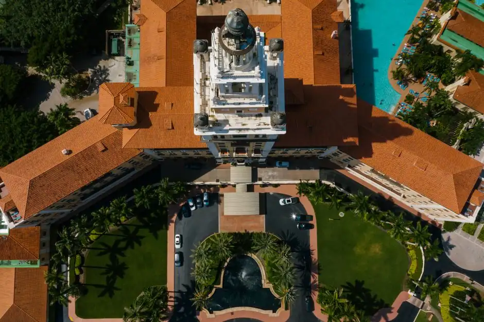 Stunning aerial view of a Miami resort with lush greenery and a luxurious pool area.